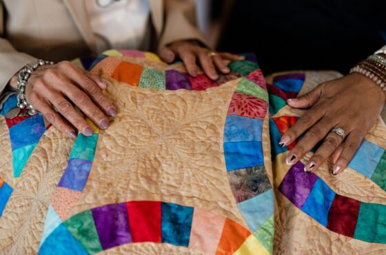 This Double Wedding Ring quilt, entitled "Love in Circles," was made for Jeri's daughter and son-in-law. The quilting was done by Karen Shively and the binding by Winnie Grigsby.
